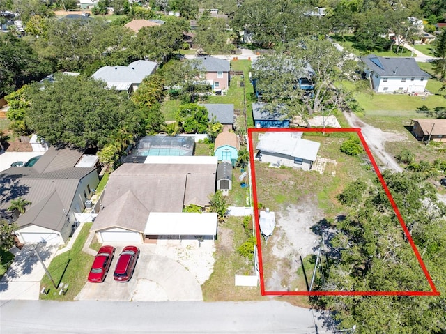 120371/2 Murray Ave, Seminole, FL 33778 - aerial perspective of suburban area featuring property parcel outlined
