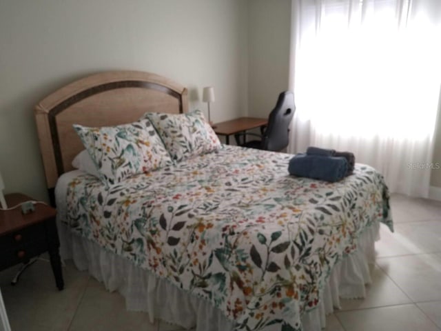 1021 16th Ave SW, Largo, FL 33770 - bedroom with light tile patterned floors