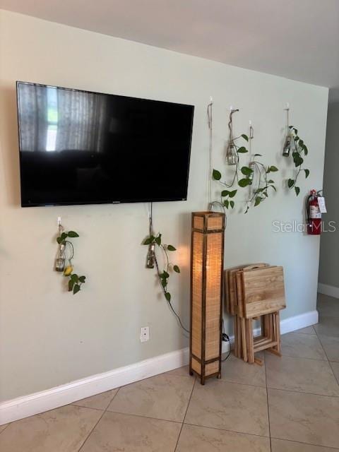 1021 16th Ave SW, Largo, FL 33770 - detailed view of a fire extinguisher and baseboards