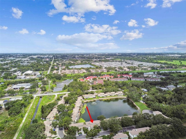 1508 Adams Cir E, Largo, FL 33771 - aerial view of residential area with a large body of water and a tree filled landscape