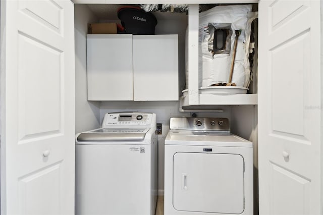 1508 Adams Cir E, Largo, FL 33771 - laundry area featuring cabinet space and washing machine and clothes dryer