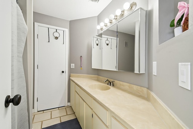 1508 Adams Cir E, Largo, FL 33771 - bathroom with vanity and tile patterned flooring