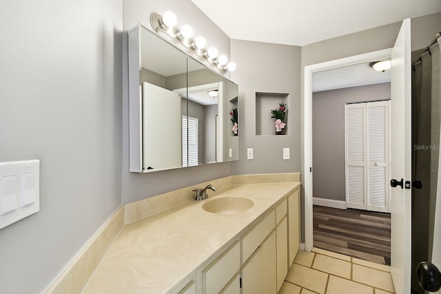 1508 Adams Cir E, Largo, FL 33771 - bathroom with vanity and tile patterned floors