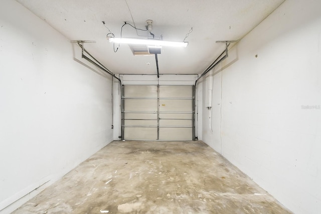 1508 Adams Cir E, Largo, FL 33771 - garage featuring a garage door opener
