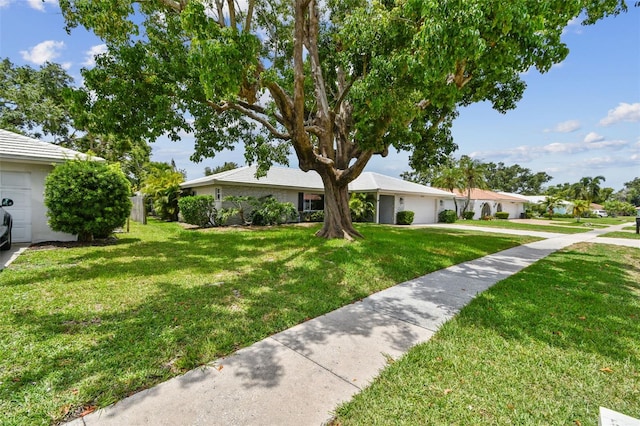 2418 Cardwell Way, Sarasota, FL 34231 - single story home with a garage, a front lawn, and concrete driveway