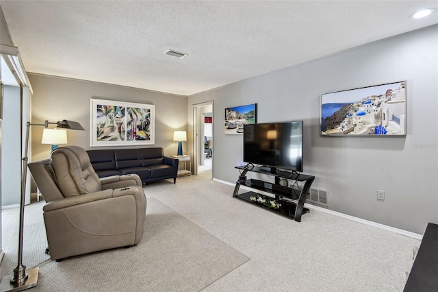2418 Cardwell Way, Sarasota, FL 34231 - carpeted living area featuring baseboards and a textured ceiling