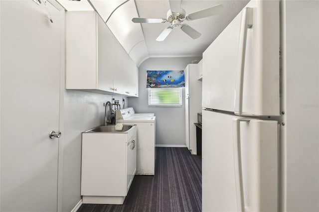 2418 Cardwell Way, Sarasota, FL 34231 - laundry area with separate washer and dryer, ceiling fan, and cabinet space