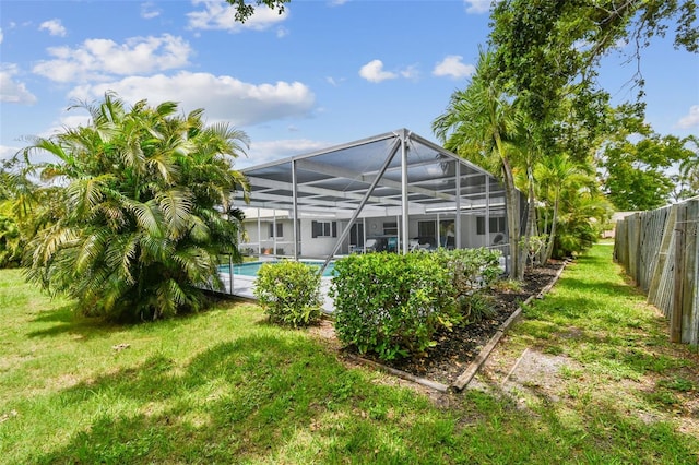 2418 Cardwell Way, Sarasota, FL 34231 - rear view of house featuring an outdoor pool and glass enclosure