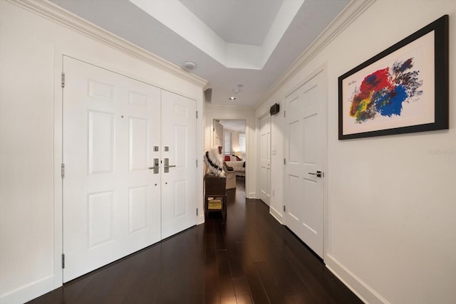 2 Seaside Ln Unit 203, Belleair, FL 33756 - foyer featuring ornamental molding and dark wood-style flooring