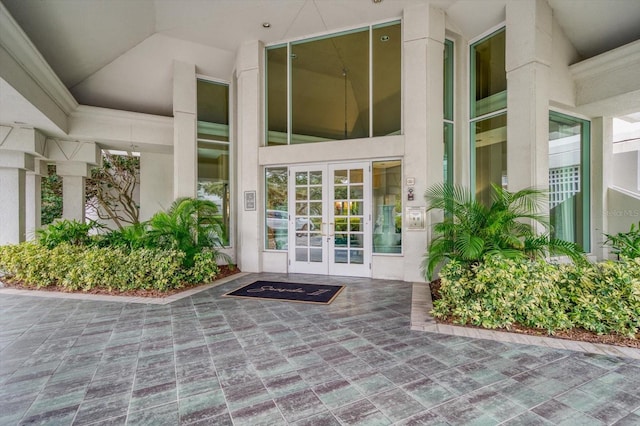 2 Seaside Ln Unit 203, Belleair, FL 33756 - entrance to property with french doors and stucco siding