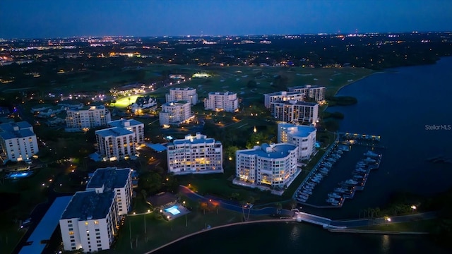 2 Seaside Ln Unit 203, Belleair, FL 33756 - aerial view at night of a view of city lights and a water view