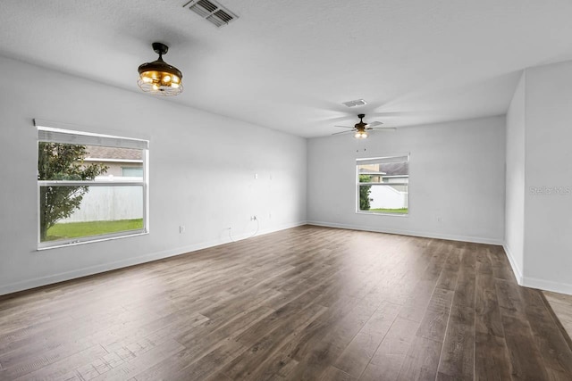 1821 Hawks View Dr, Ruskin, FL 33570 - spare room with wood finished floors and ceiling fan