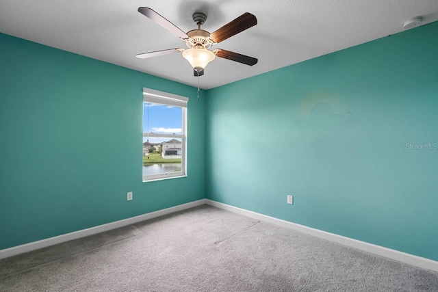 1821 Hawks View Dr, Ruskin, FL 33570 - carpeted empty room featuring a ceiling fan and a smoke detector