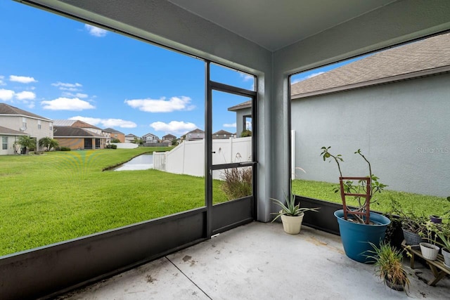 1821 Hawks View Dr, Ruskin, FL 33570 - sunroom / solarium featuring a residential view