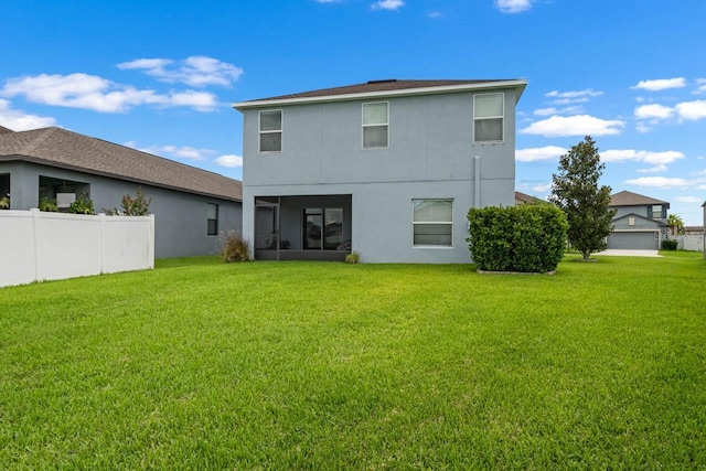 1821 Hawks View Dr, Ruskin, FL 33570 - back of house featuring stucco siding and a sunroom