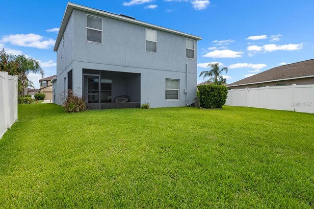 1821 Hawks View Dr, Ruskin, FL 33570 - back of property featuring stucco siding
