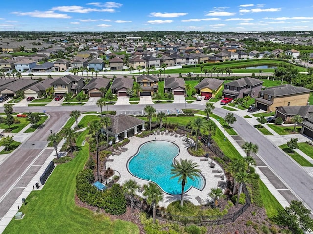 1821 Hawks View Dr, Ruskin, FL 33570 - aerial view of residential area with a pool and a large body of water