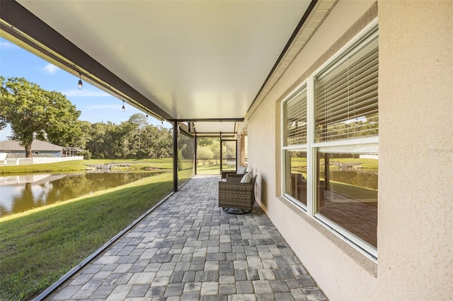 5131 Gato Del Sol Cir, Wesley Chapel, FL 33544 - view of patio with a water view