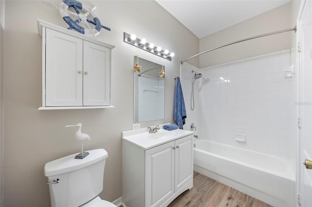 5131 Gato Del Sol Cir, Wesley Chapel, FL 33544 - full bathroom featuring vanity, shower / bathtub combination, and wood finished floors