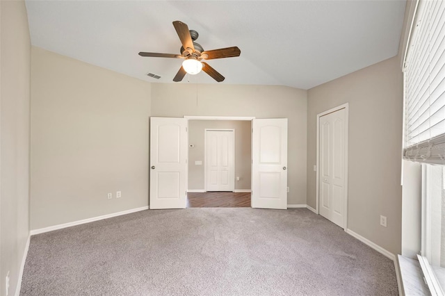 5131 Gato Del Sol Cir, Wesley Chapel, FL 33544 - unfurnished bedroom featuring carpet flooring, ceiling fan, and a closet