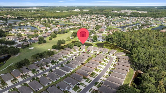 5131 Gato Del Sol Cir, Wesley Chapel, FL 33544 - aerial view of property's location with nearby suburban area and a large body of water