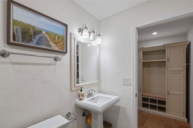 302 Eastleigh Dr, Belleair, FL 33756 - bathroom with stone finish floors and recessed lighting