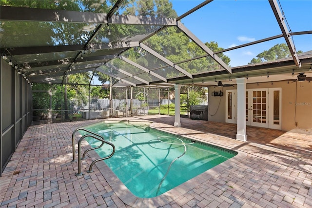 302 Eastleigh Dr, Belleair, FL 33756 - view of swimming pool featuring a patio, glass enclosure, french doors, and ceiling fan