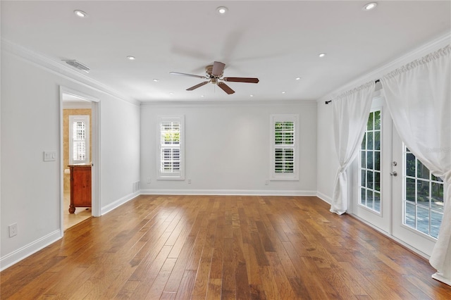 302 Eastleigh Dr, Belleair, FL 33756 - spare room featuring a ceiling fan, hardwood / wood-style flooring, crown molding, and recessed lighting