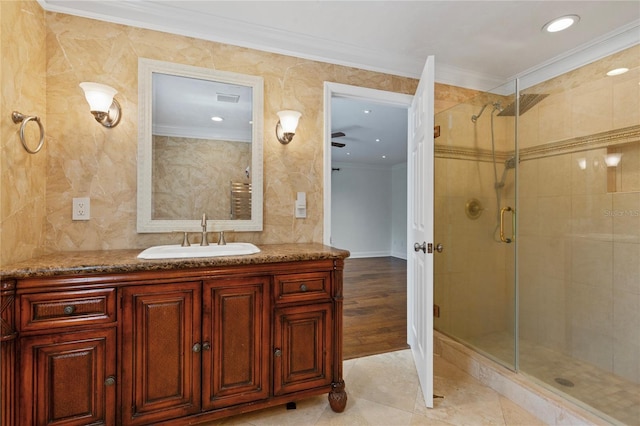 302 Eastleigh Dr, Belleair, FL 33756 - full bathroom featuring ornamental molding, a stall shower, vanity, recessed lighting, and tile patterned floors