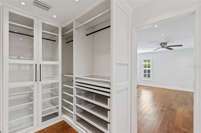 302 Eastleigh Dr, Belleair, FL 33756 - walk in closet with hardwood / wood-style floors and ceiling fan