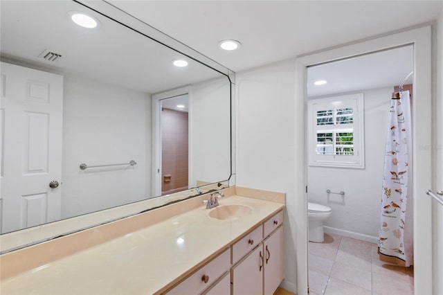 302 Eastleigh Dr, Belleair, FL 33756 - bathroom featuring vanity, tile patterned flooring, and recessed lighting