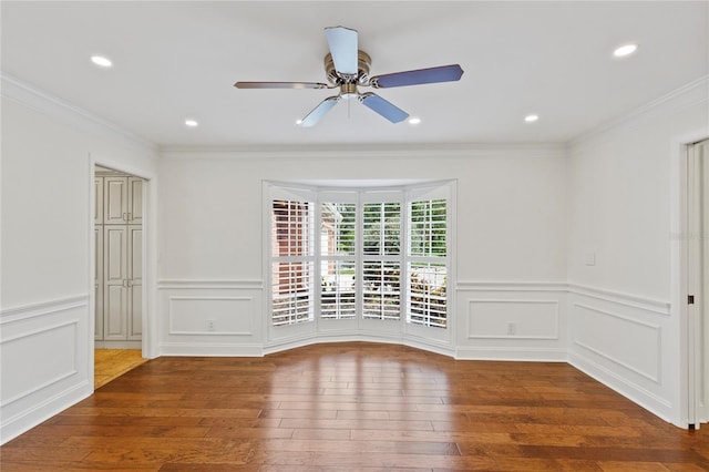 302 Eastleigh Dr, Belleair, FL 33756 - spare room featuring hardwood / wood-style flooring, a ceiling fan, crown molding, recessed lighting, and a decorative wall