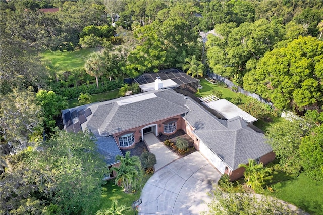 302 Eastleigh Dr, Belleair, FL 33756 - aerial view of property and surrounding area with a heavily wooded area