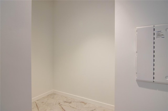 777 3rd Ave N Unit 1704, Saint Petersburg, FL 33701 - empty room with baseboards and light marble finish floors