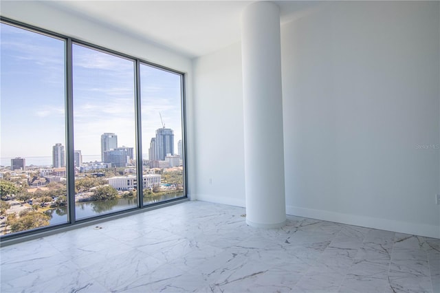 777 3rd Ave N Unit 1704, Saint Petersburg, FL 33701 - spare room featuring a skyline view and marble finish floors
