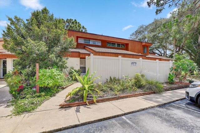 2078 Sunset Point Rd Unit 83, Clearwater, FL 33765 - view of front of home featuring uncovered parking