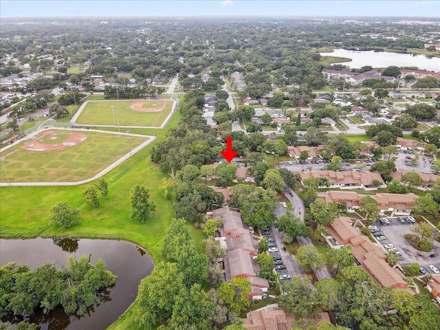 2078 Sunset Point Rd Unit 83, Clearwater, FL 33765 - aerial view of property's location featuring a large body of water and nearby suburban area