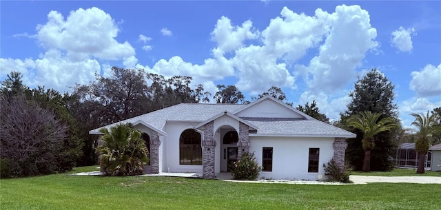 199 N Crystal Meadow Path, Lecanto, FL 34461 - view of front of house featuring a front yard and a shingled roof
