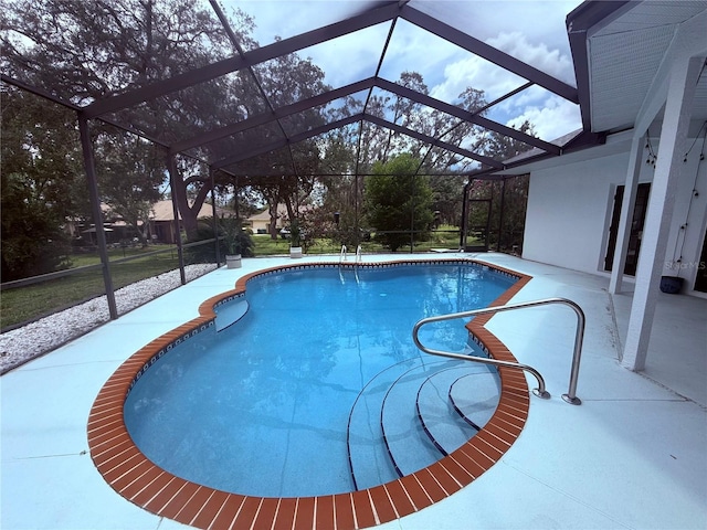 199 N Crystal Meadow Path, Lecanto, FL 34461 - swimming pool featuring a patio area and glass enclosure