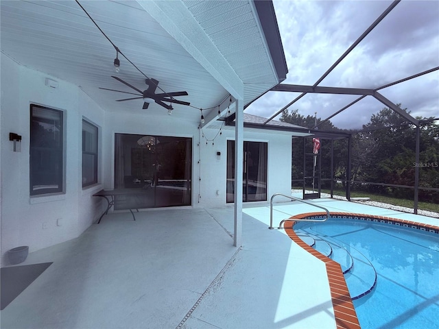 199 N Crystal Meadow Path, Lecanto, FL 34461 - swimming pool with a patio, a ceiling fan, and glass enclosure