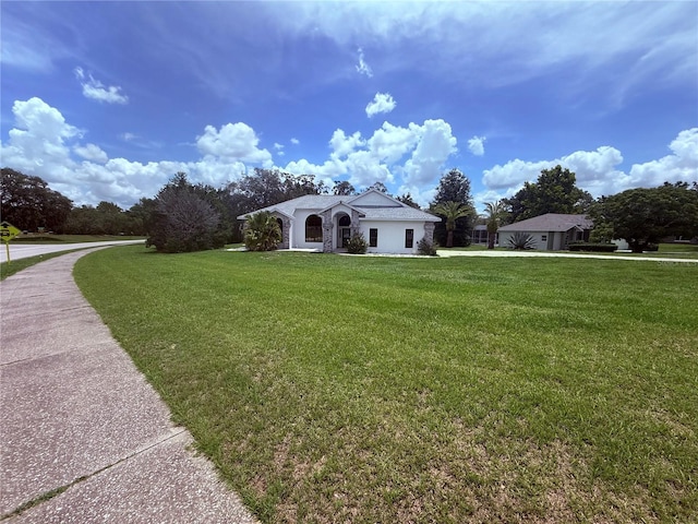 199 N Crystal Meadow Path, Lecanto, FL 34461 - ranch-style house featuring a front lawn