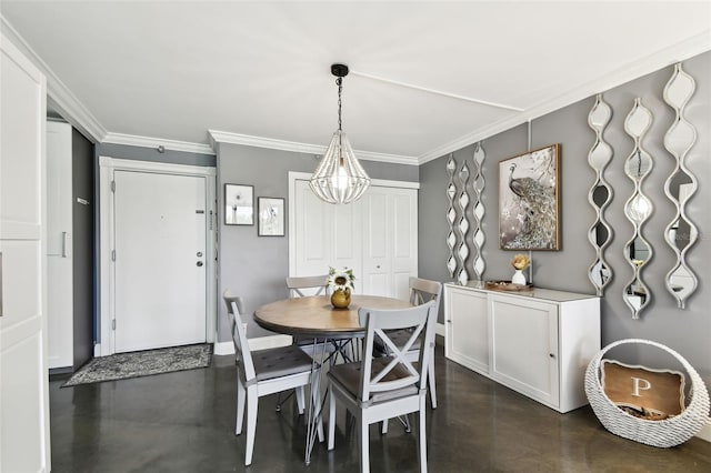 255 Dolphin Pt Unit 207, Clearwater Beach, FL 33767 - dining area featuring finished concrete floors, crown molding, and a chandelier