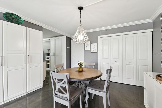 255 Dolphin Pt Unit 207, Clearwater Beach, FL 33767 - dining room with crown molding, a chandelier, and concrete flooring