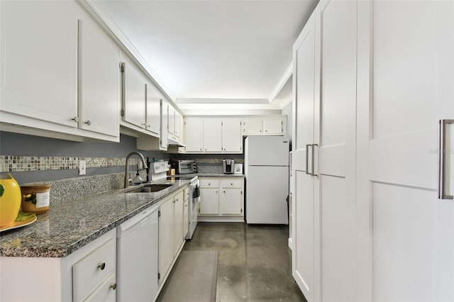 255 Dolphin Pt Unit 207, Clearwater Beach, FL 33767 - kitchen with white appliances, concrete floors, white cabinets, under cabinet range hood, and dark stone countertops