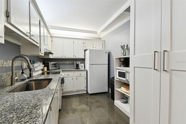 255 Dolphin Pt Unit 207, Clearwater Beach, FL 33767 - kitchen featuring white appliances, crown molding, finished concrete floors, white cabinetry, and dark stone countertops