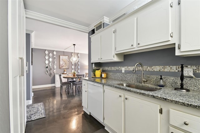 255 Dolphin Pt Unit 207, Clearwater Beach, FL 33767 - kitchen with white dishwasher, decorative backsplash, finished concrete floors, crown molding, and white cabinets