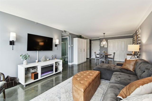 255 Dolphin Pt Unit 207, Clearwater Beach, FL 33767 - living area featuring finished concrete flooring and crown molding