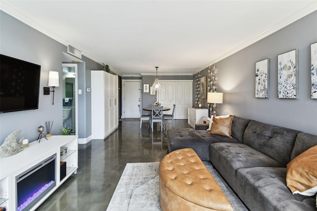 255 Dolphin Pt Unit 207, Clearwater Beach, FL 33767 - living area featuring finished concrete flooring and ornamental molding
