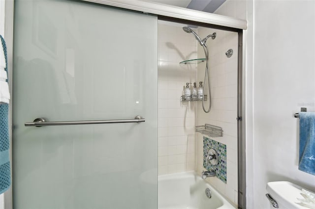 255 Dolphin Pt Unit 207, Clearwater Beach, FL 33767 - full bathroom with toilet and bath / shower combo with glass door
