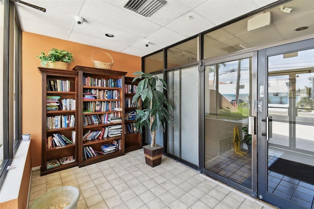 255 Dolphin Pt Unit 207, Clearwater Beach, FL 33767 - common area featuring a surveillance system and a paneled ceiling